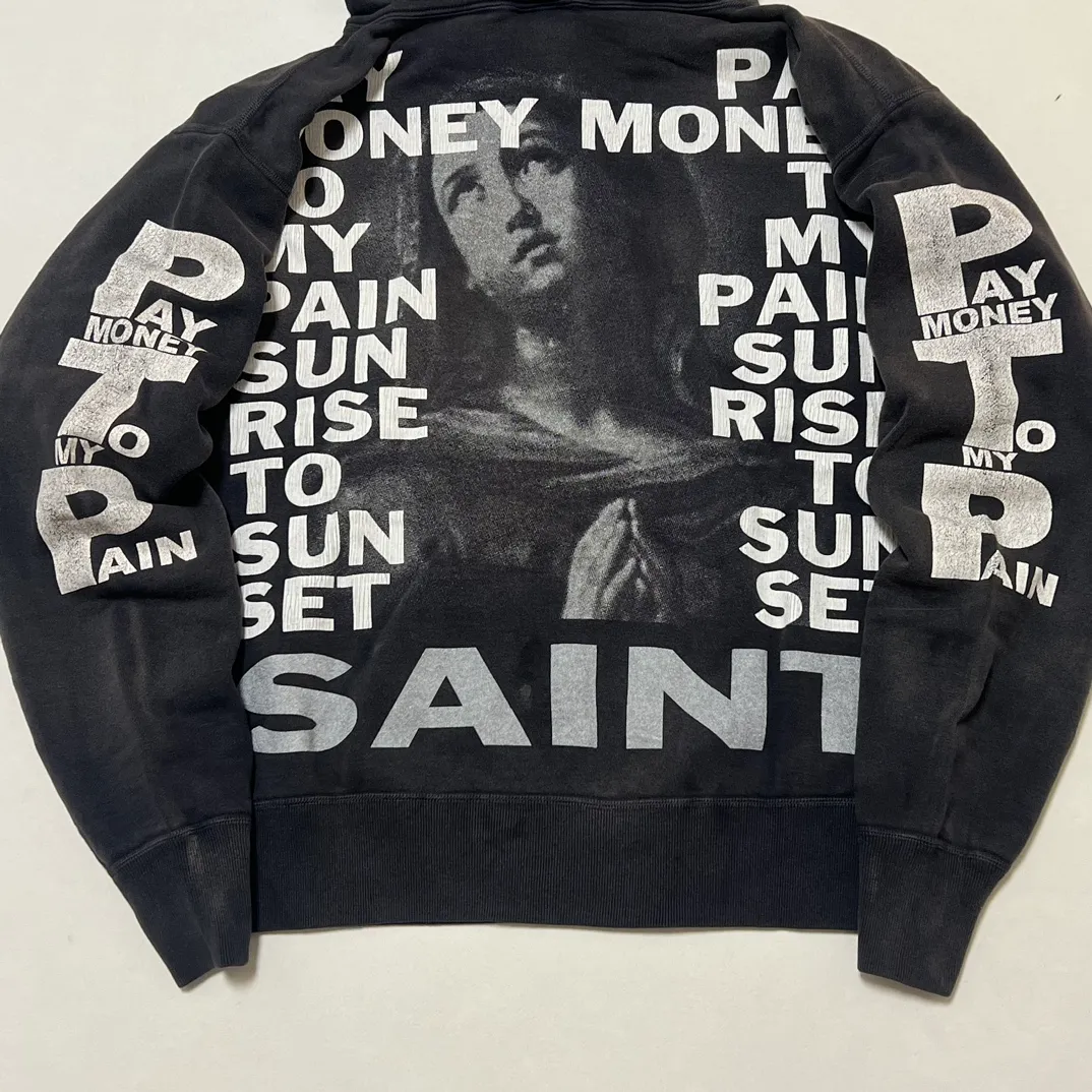 SAINT Mxxxxxx × PAY MONEY TO MY PAIN PTP_HOODIE/BRAND MONEY/BLK Co-branded PTP Virgin Mary dollar hoodie Washed black S-XL Assute dyeing The whole piece is sprayed with horse fade Mold customization joint main mark/washed mark Factory four-needle and six-thread workmanship No bone seams More comfortable to wear Repeated modification of proofing Authentic grade crack printing VINTAGE value is full